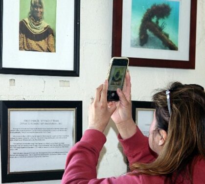 Woman taking photo of Polly Parker portrait